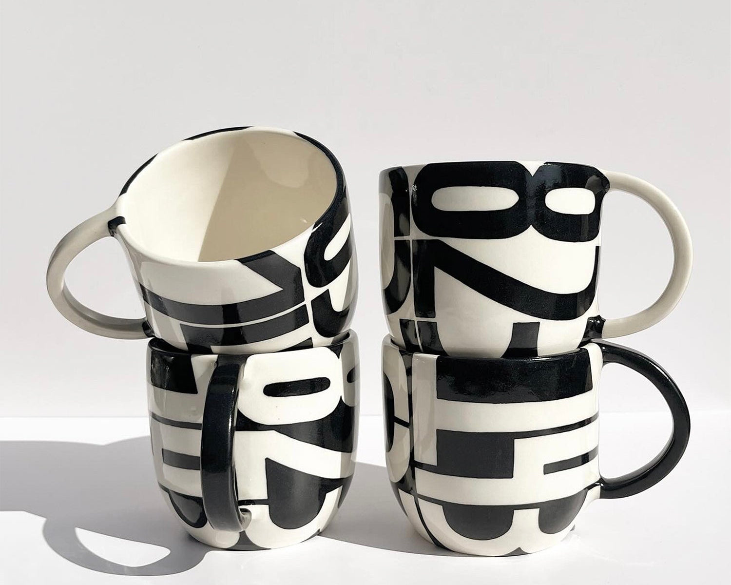 Hand-painted pager codes mugs: "143", "637", and "823"